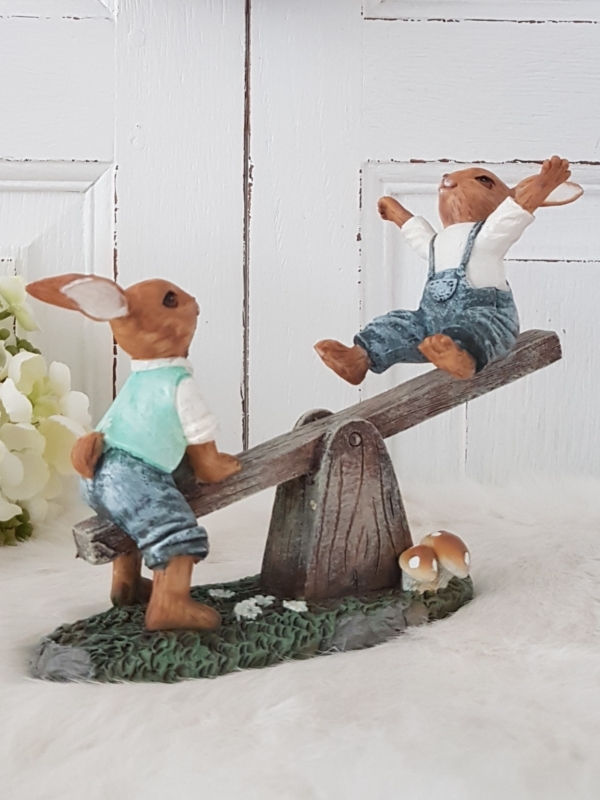 nostalgische Hasen auf Wippe - blau / grün - Höhe 13 cm